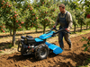 Orchard to-hjulet g&aring;traktor med rotorkultivator